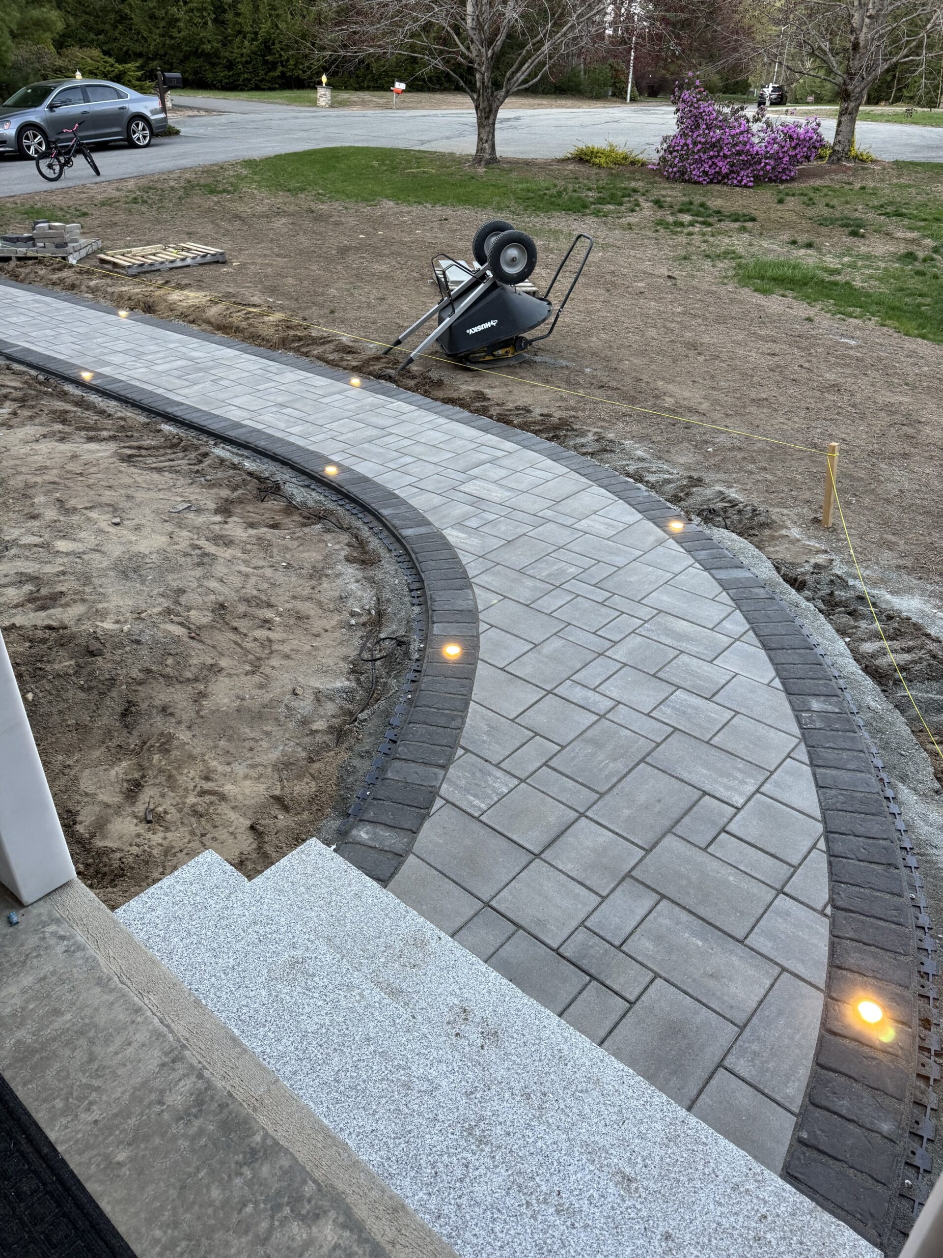 stone walkway front of the house