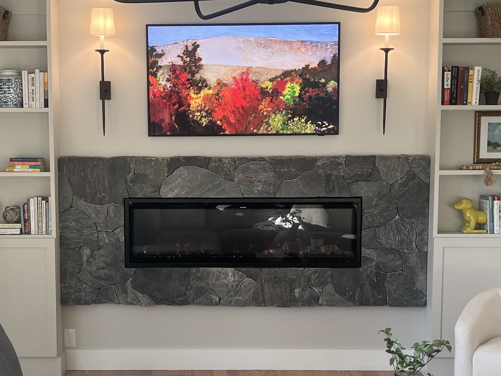 indoor recessed fireplace with stone border